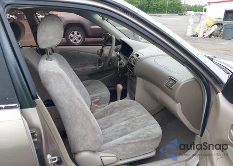 1999 Toyota Corolla Le из США, поврежденный, VIN 2T1BR12E9XC204275